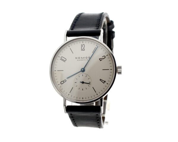 NOMOS GLASHÜTTE Tangente Herrenuhr mit Edelstahlgehäuse, Quartzwerk, Lederband und Original-Holzbox.