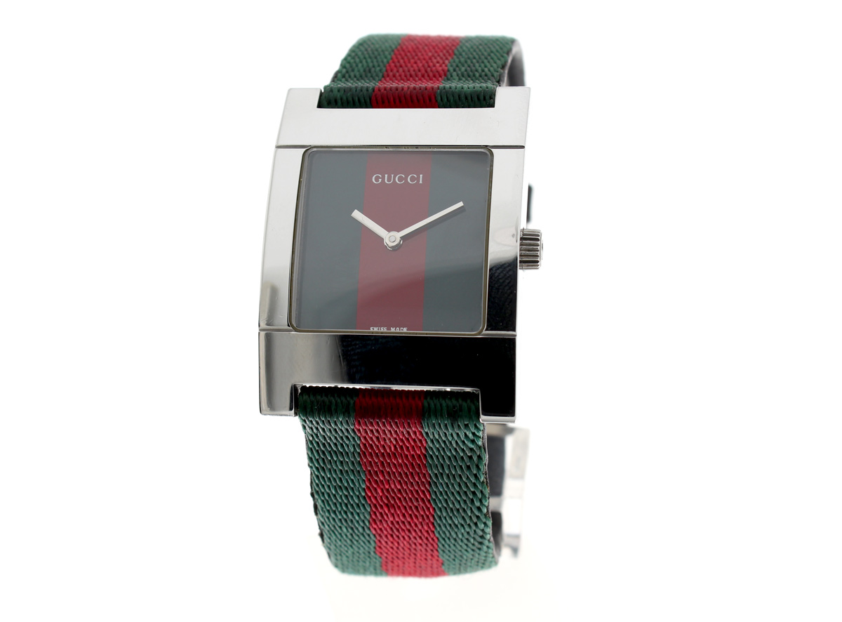 GUCCI Armbanduhr mit Edelstahlgehäuse, ETA-Quarzwerk, original Gucci-Faltschließe und Gucci-Textilband.