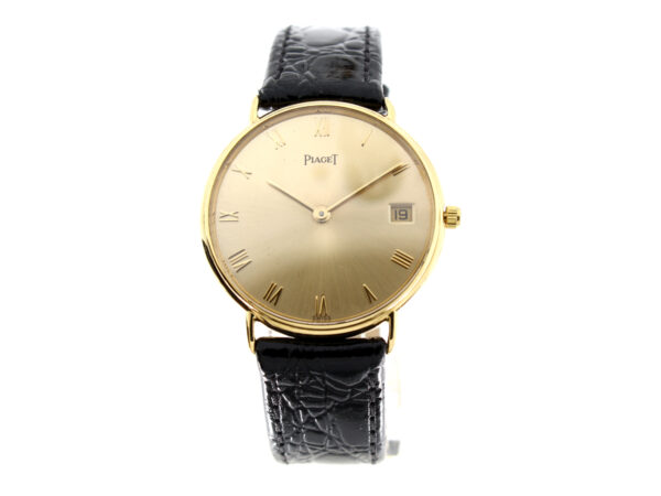 PIAGET Herrenuhr mit 18-Karat-Goldgehäuse, Quartzwerk, Lederband und Dornschließe.